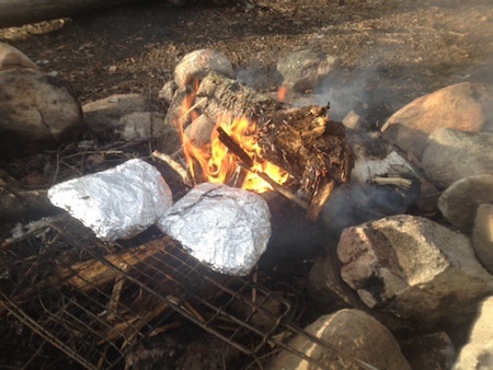 Cooking dinner over the grill